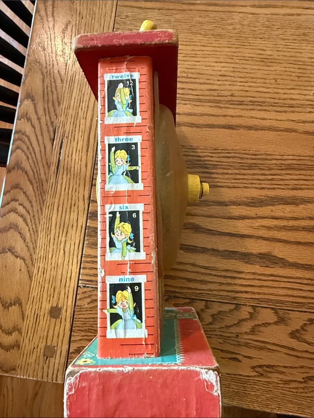 Fisher-Price Red and Yellow Schoolhouse Clock Toy with Blue Dial